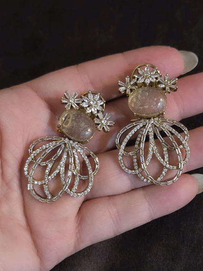Three Baguette flower top earrings with oval coloured stones and loop design