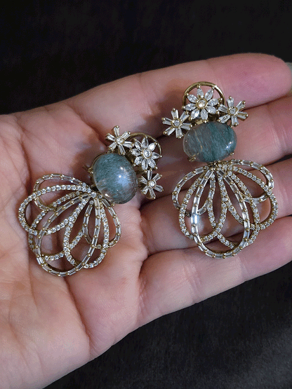 Three Baguette flower top earrings with oval coloured stones and loop design