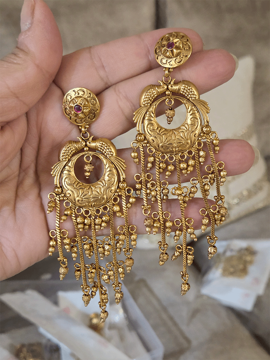 Ruby stone top with peacock sides design chain tassels with ghunghru hangings earrings