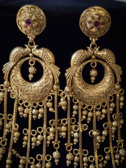 Ruby stone top with peacock sides design chain tassels with ghunghru hangings earrings