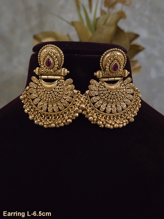 Tear drop ruby stone circular top earrings with half flower design bottom with ghunghru hangings