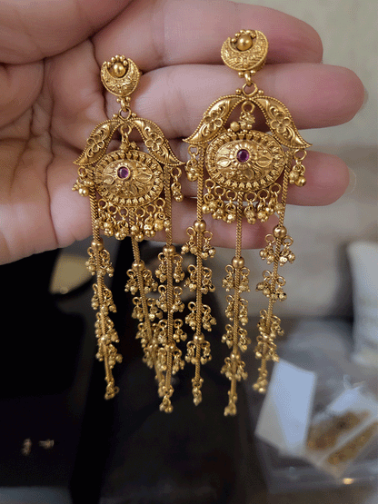 Ruby stones oval and leaf sides design three chain tassels with ghunghru hangings 13cm long earrings