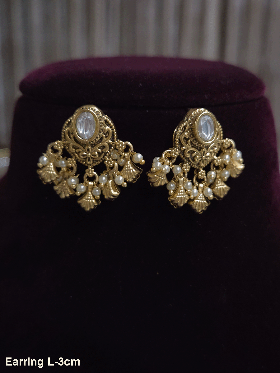 Oval kundan traditional design shell design drops earrings