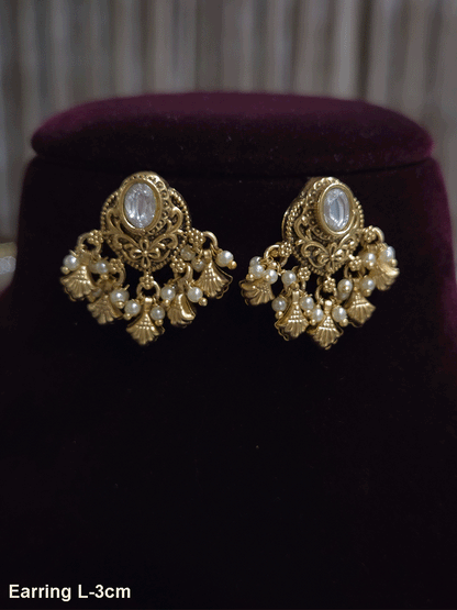 Oval kundan traditional design shell design drops earrings