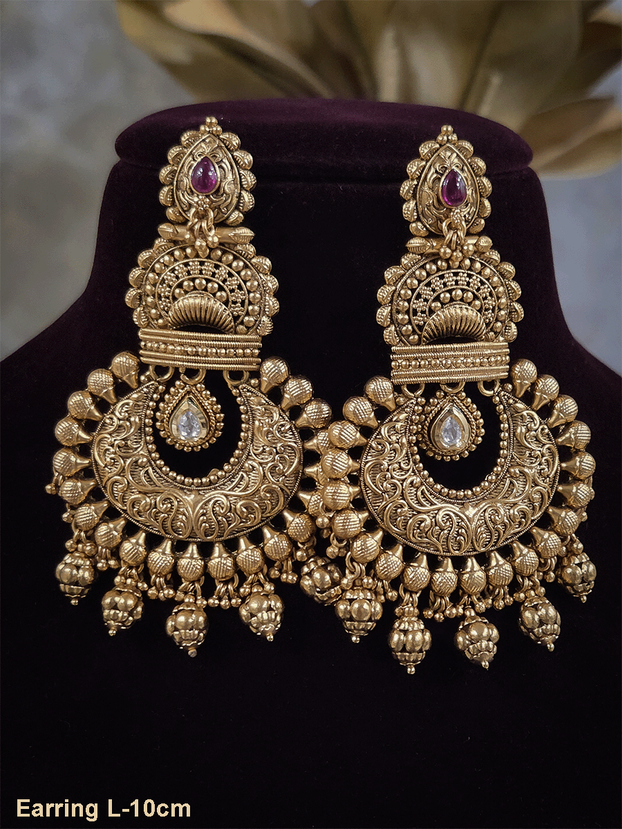 Tear drop stone leaf top chandbali design 10cm long earrings with kundan tukdi hanging
