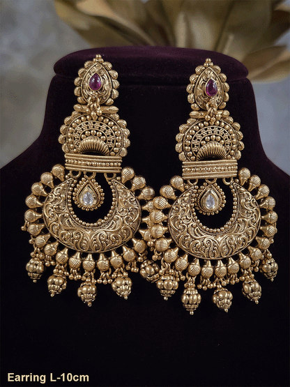 Tear drop stone leaf top chandbali design 10cm long earrings with kundan tukdi hanging