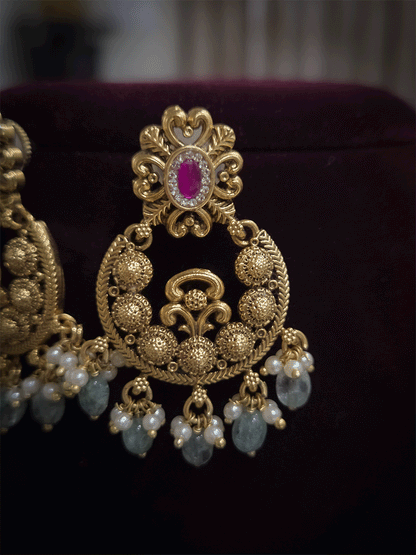 Small circular design with aqua bead drops and oval ruby stone top earrings