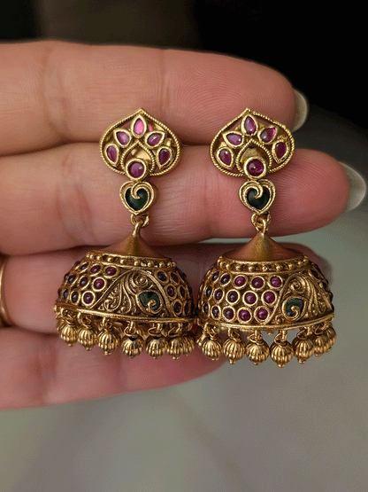 Ruby and green stones leaf design top and peacock motif domb jhoomkies