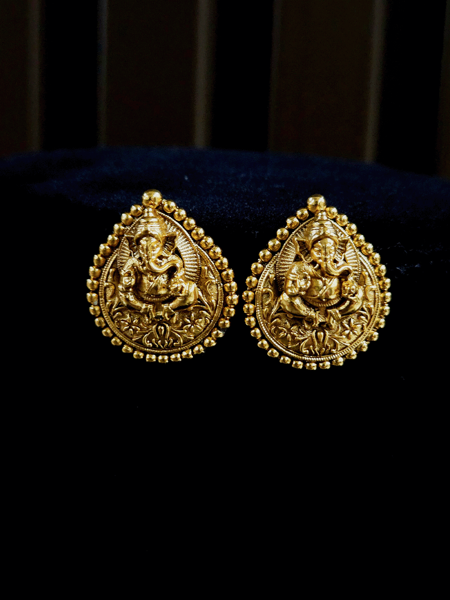 Ganpatiji motif in leaf shaped self design studs