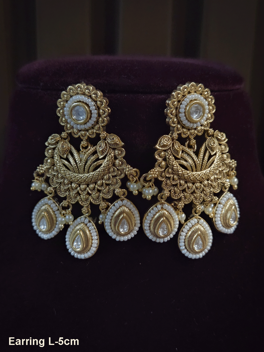 Kundan with pirohi circular top classy earrings with three tear drop tukdi drops