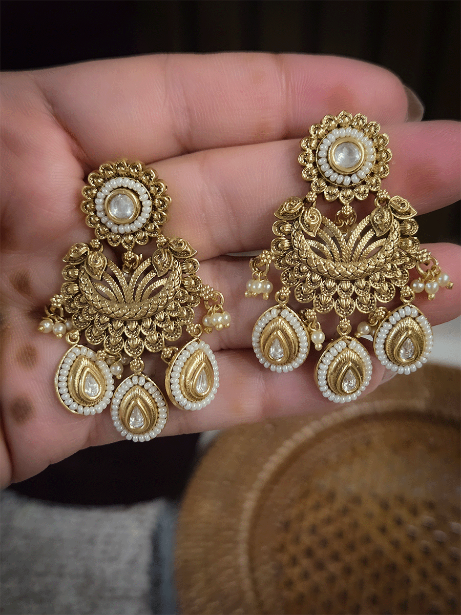 Kundan with pirohi circular top classy earrings with three tear drop tukdi drops