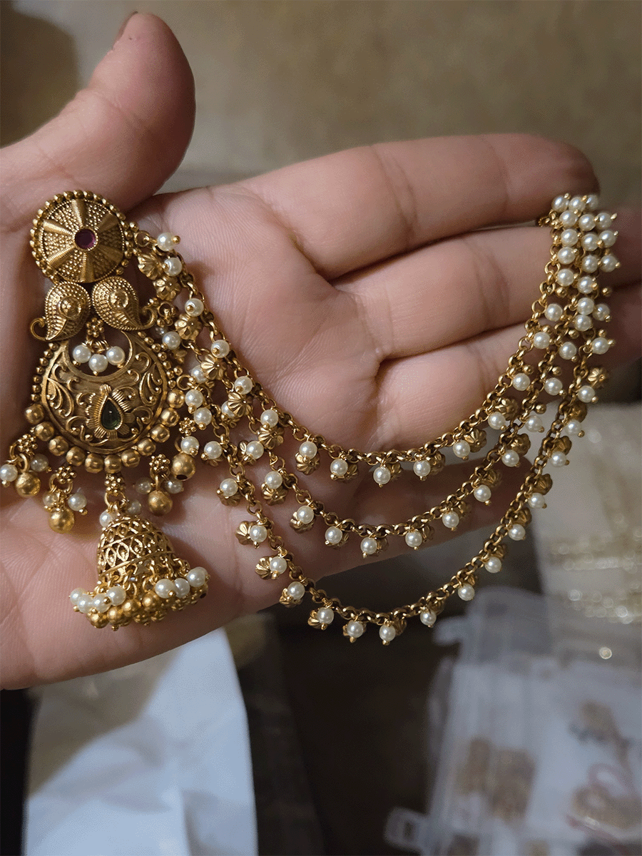 Circular top and paisley design long jhoomki with flower design triple side chains