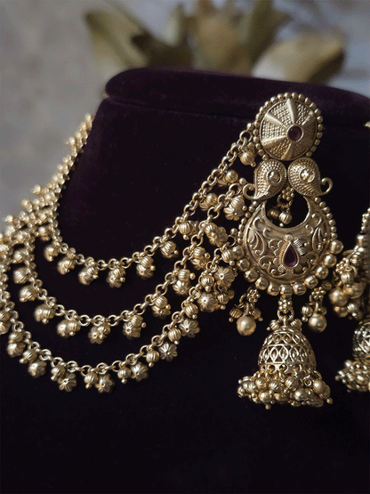 Circular top and paisley design long jhoomki with flower design triple side chains
