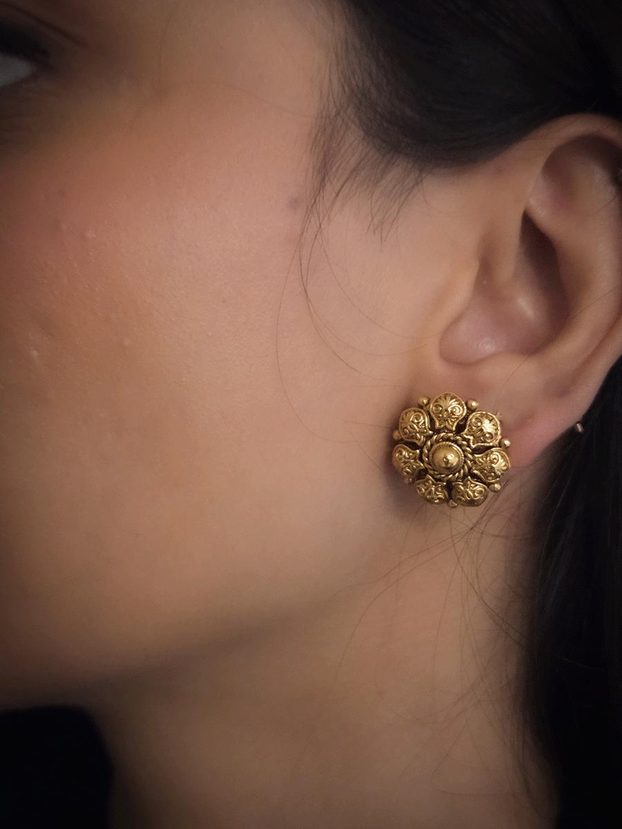Self design with center gold bead flower shaped studs