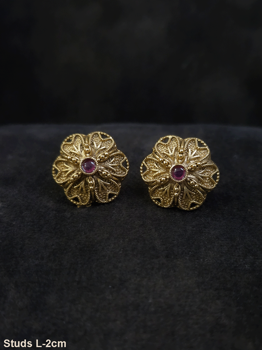 Flower design 2cm broad studs with ruby stone in center