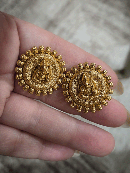 Round bold Ganpatiji self desgin studs with intricate design on circumference