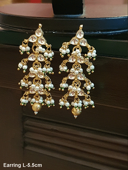 Kundan leaf design earring with green bead detailing(5.5cm long)