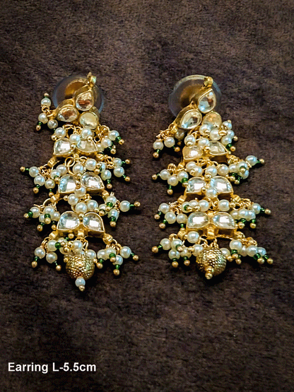 Kundan leaf design earring with green bead detailing(5.5cm long)