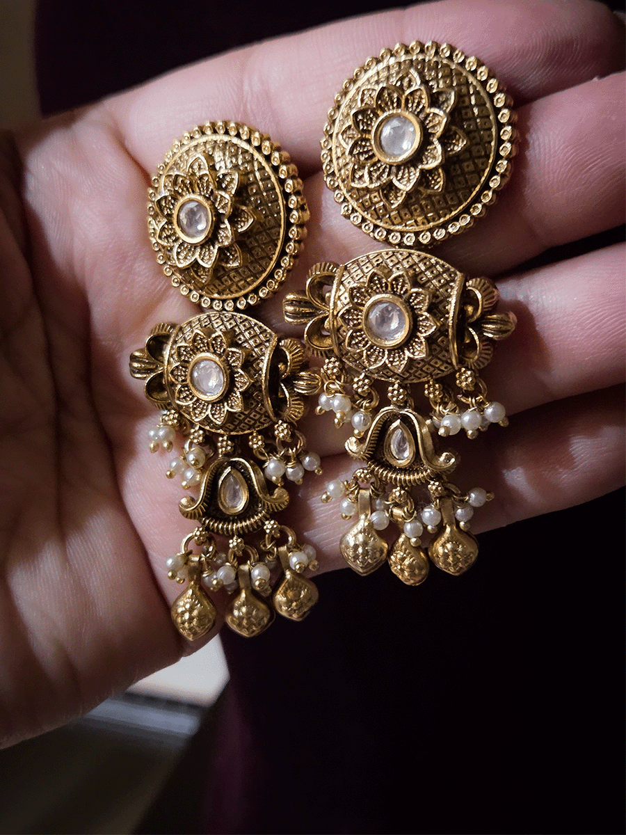 Self design circular top with kundan in flower center earrings with leaf shaped ghunghru