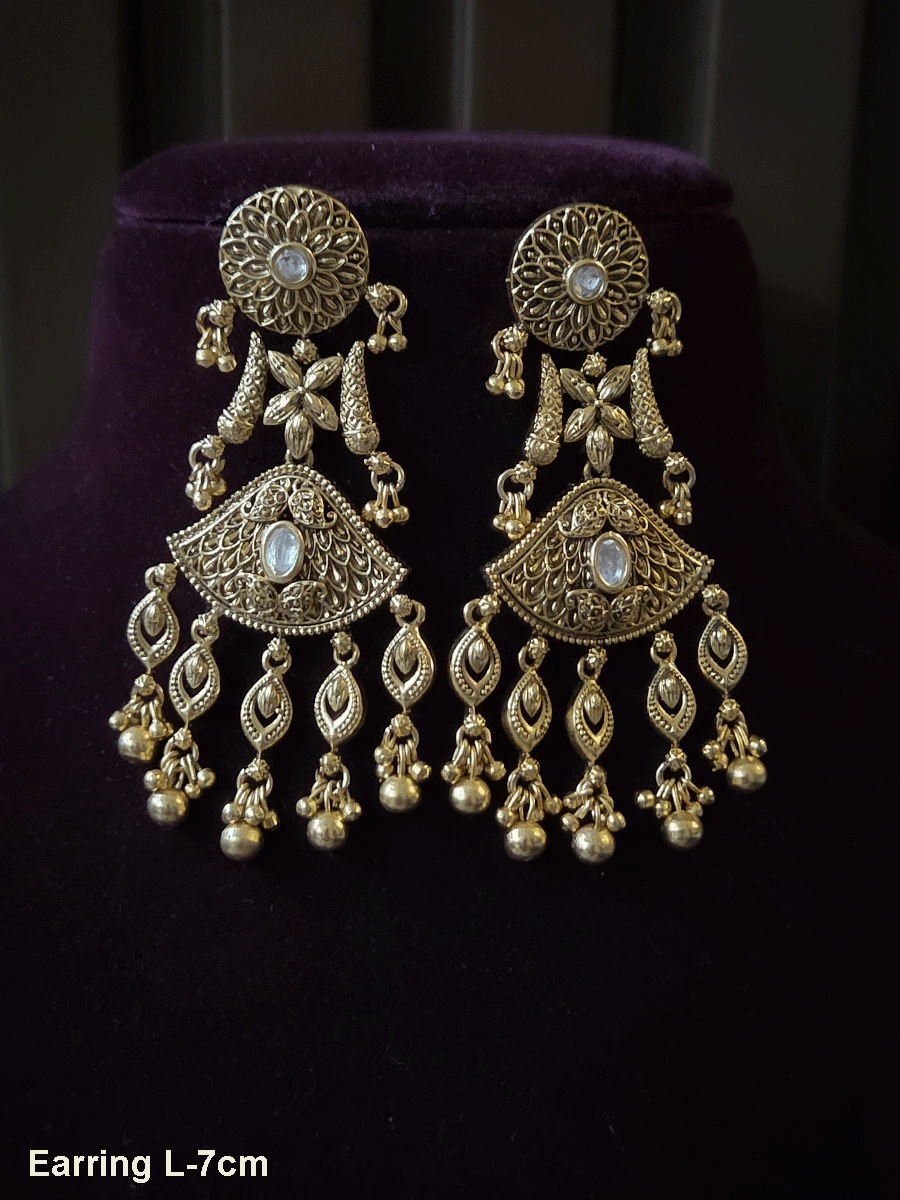 Self design antique finish 7 cm long kundan earrings