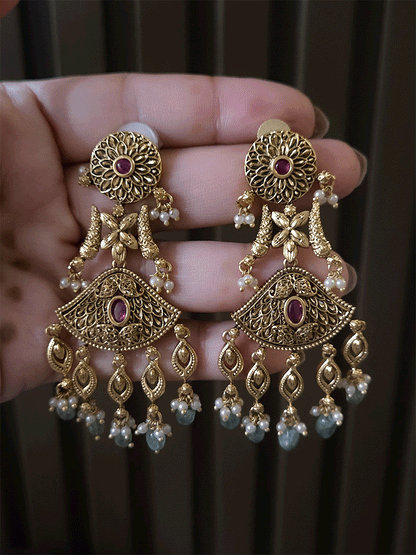 Self design antique finish 7 cm long kundan earrings