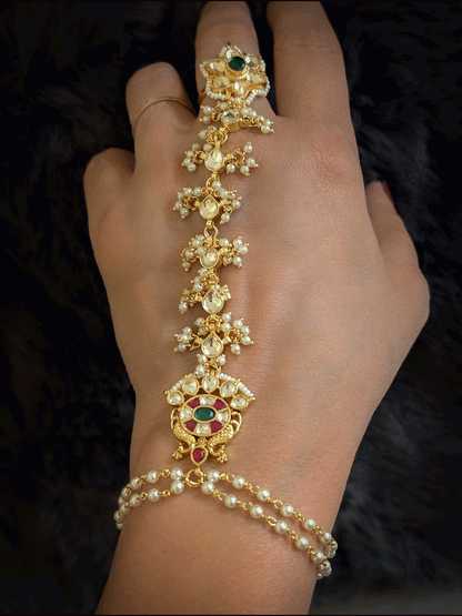 Green stone paachi kundan ring and peacock design tukdi with leaf shaped pearly hanging chain haathphool(single)
