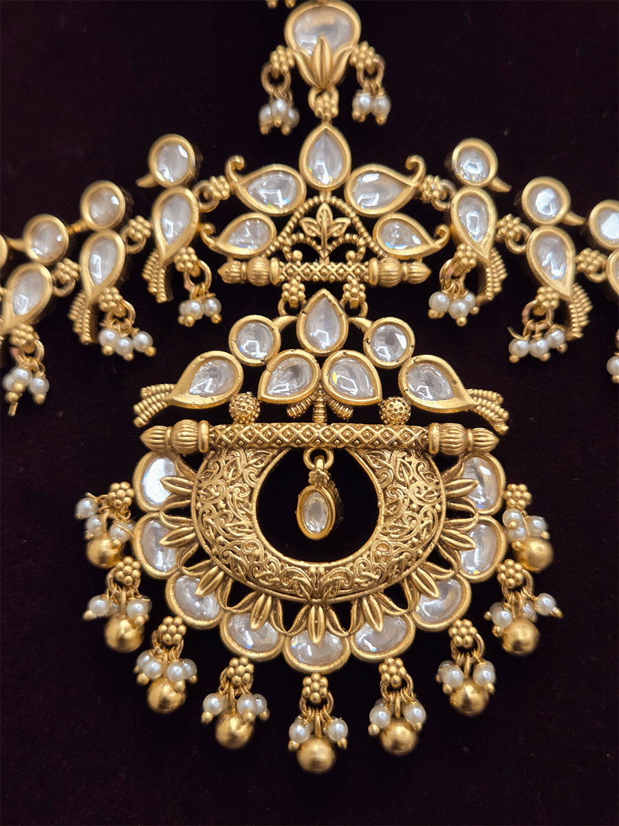 Kundan embedded peacock side string with Chandbali design center mathapatti