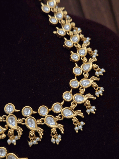 Kundan embedded peacock side string with Chandbali design center mathapatti