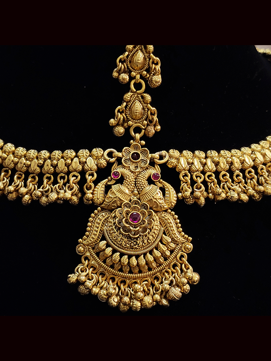 Peacock top center with flower design ruby stone mathapatti with ghunghru hangings