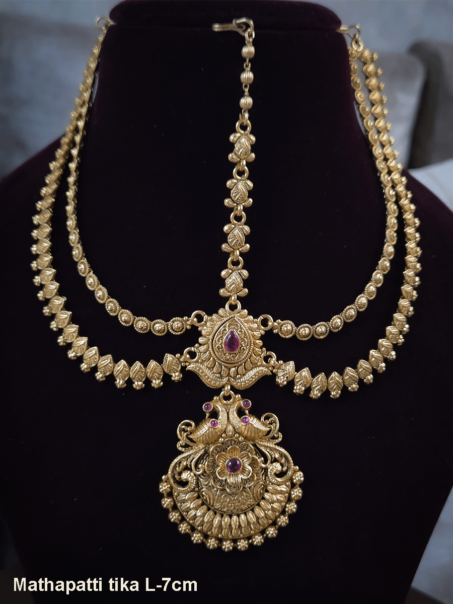 Peacock on both sides of half flower with tear drop ruby stone top two chains mathapatti