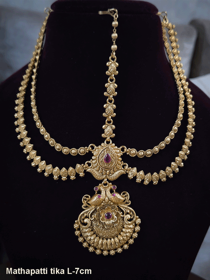 Peacock on both sides of half flower with tear drop ruby stone top two chains mathapatti