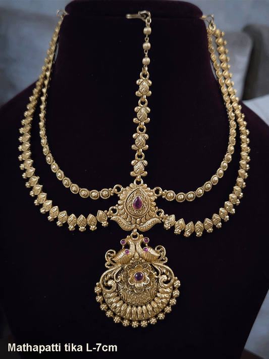 Peacock on both sides of half flower with tear drop ruby stone top two chains mathapatti