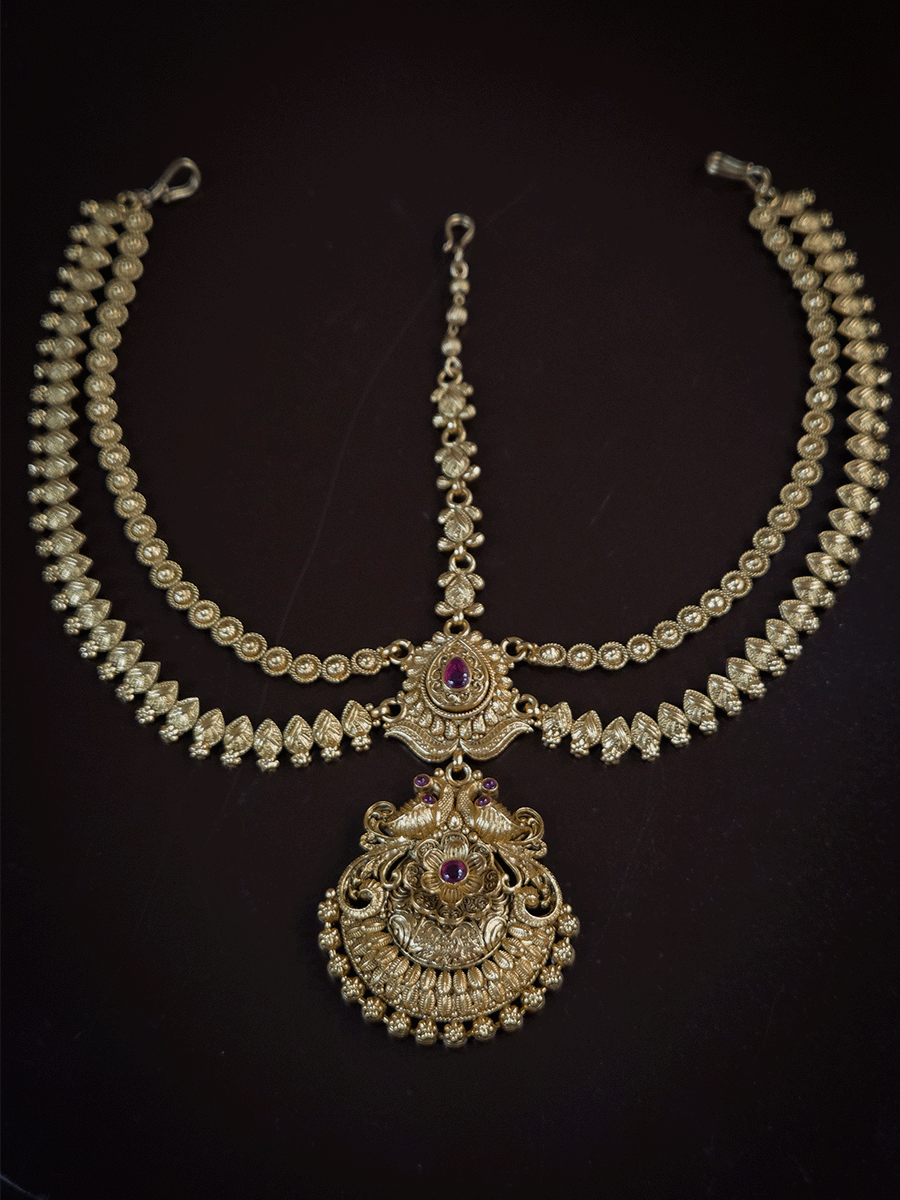 Peacock on both sides of half flower with tear drop ruby stone top two chains mathapatti