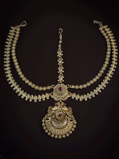 Peacock on both sides of half flower with tear drop ruby stone top two chains mathapatti