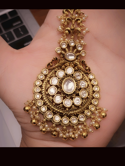 Oval stone center antique gold finish kundan maangtika