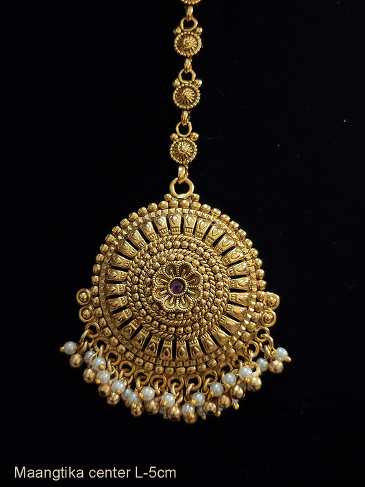 Circular maangtika with flower design center with pearl and gold bead hangings