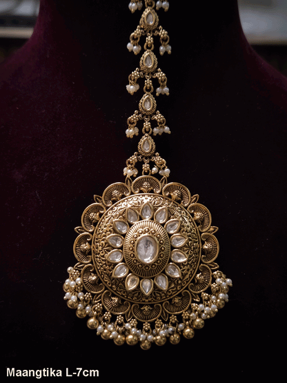 Circular oval center design with oval stone bead hangings maangtika