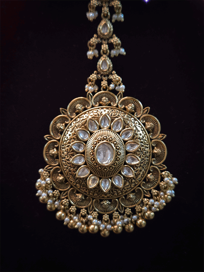 Circular oval center design with oval stone bead hangings maangtika