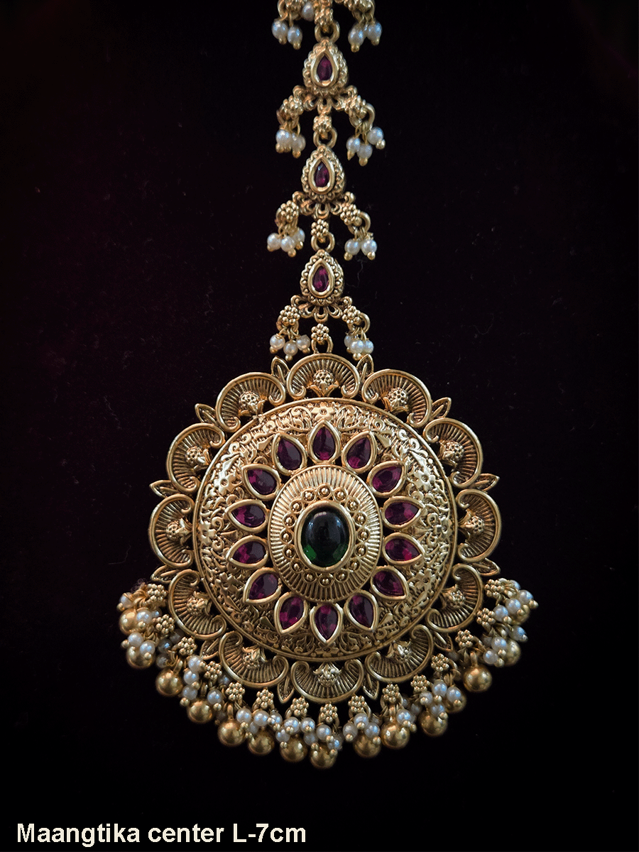 Circular oval center design with oval stone bead hangings maangtika