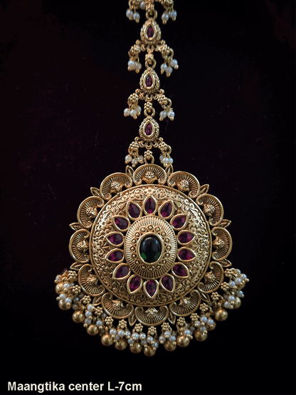 Circular oval center design with oval stone bead hangings maangtika