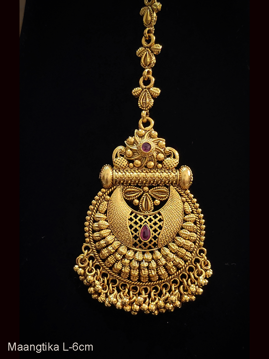 Circular leafy design ruby stone maangtika with three leaf design chain