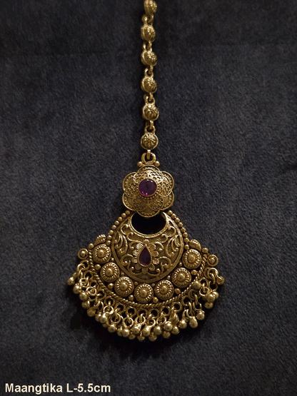Circular self with gold bead design flower top maangtika with coloured stones
