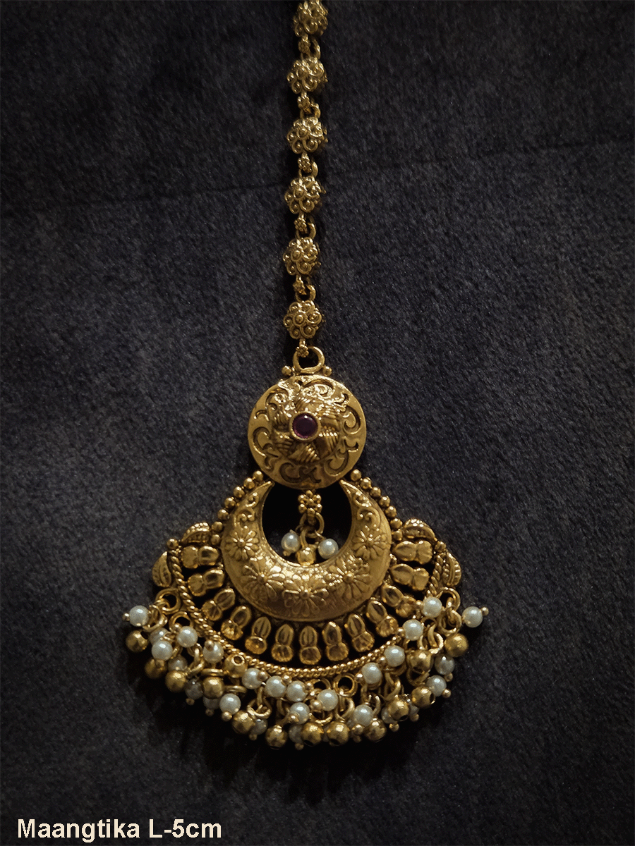 Chandbali design maangtika with circular top ruby stone design