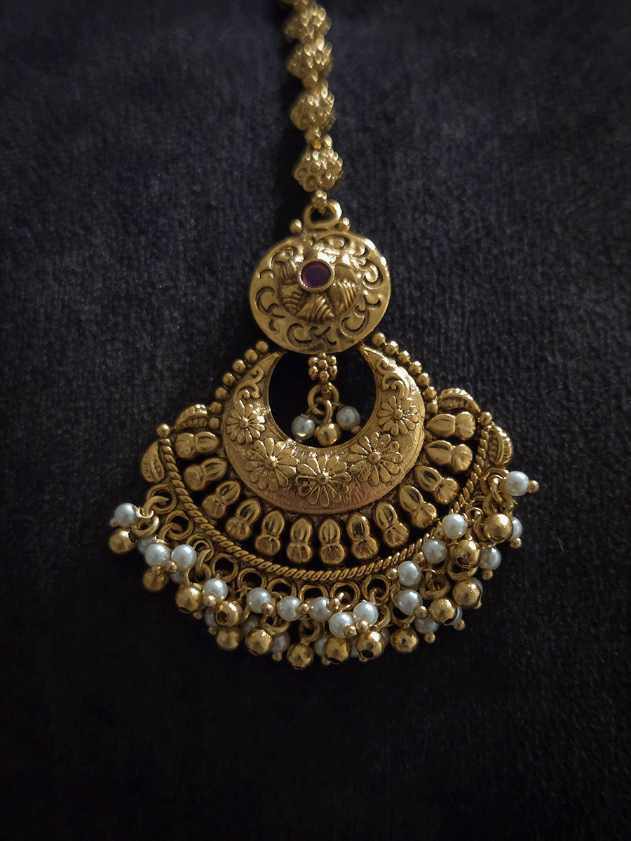 Chandbali design maangtika with circular top ruby stone design