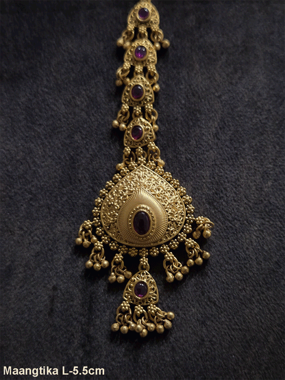 Oval stone leaf shaped center maangtika with triangular hanging tukdi