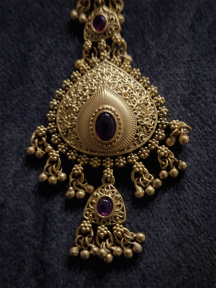 Oval stone leaf shaped center maangtika with triangular hanging tukdi