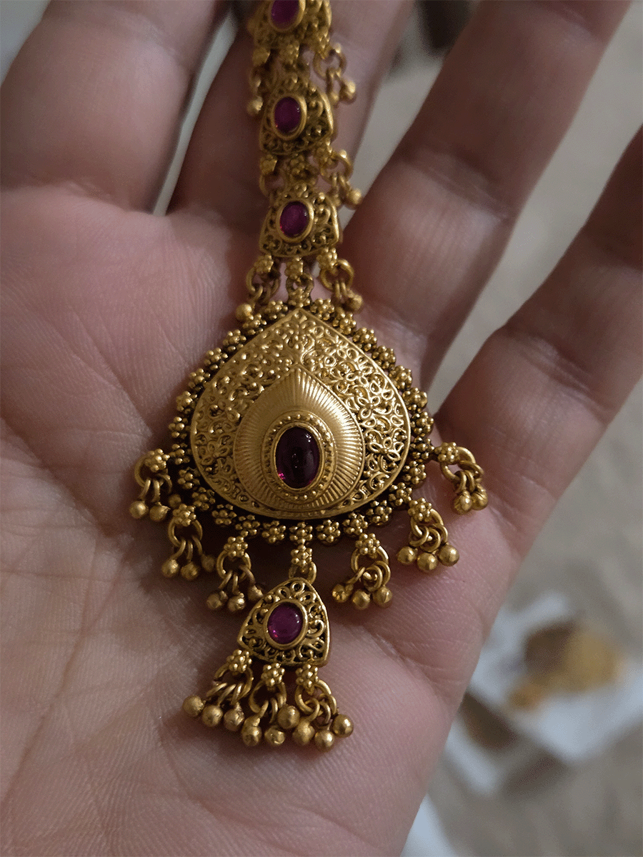 Oval stone leaf shaped center maangtika with triangular hanging tukdi