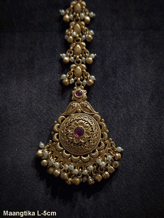 Flower and paisley top with circular flower with ruby stone maangtika