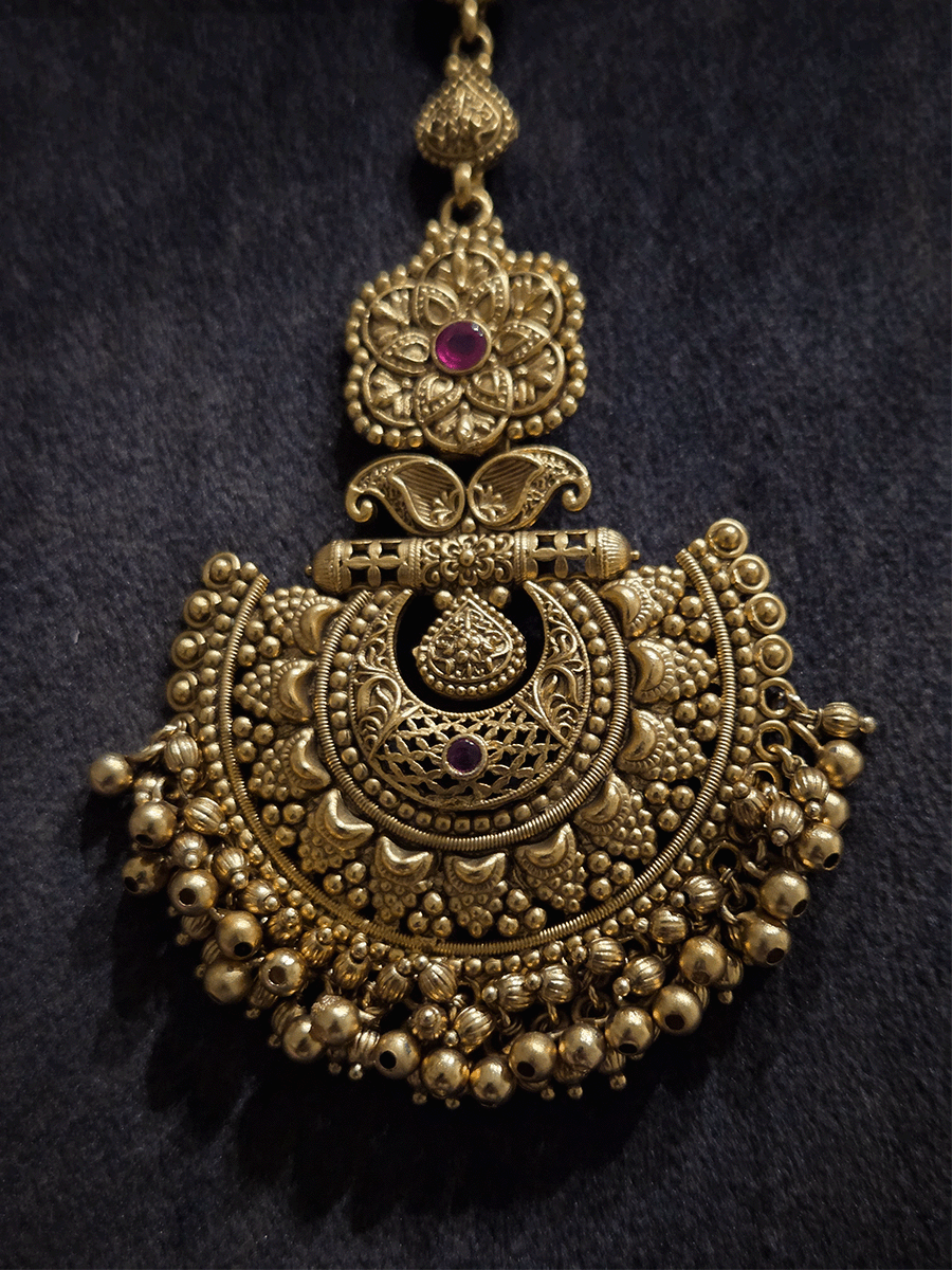 Flower top with paisley design half moon design maangtika with gold bead hangings