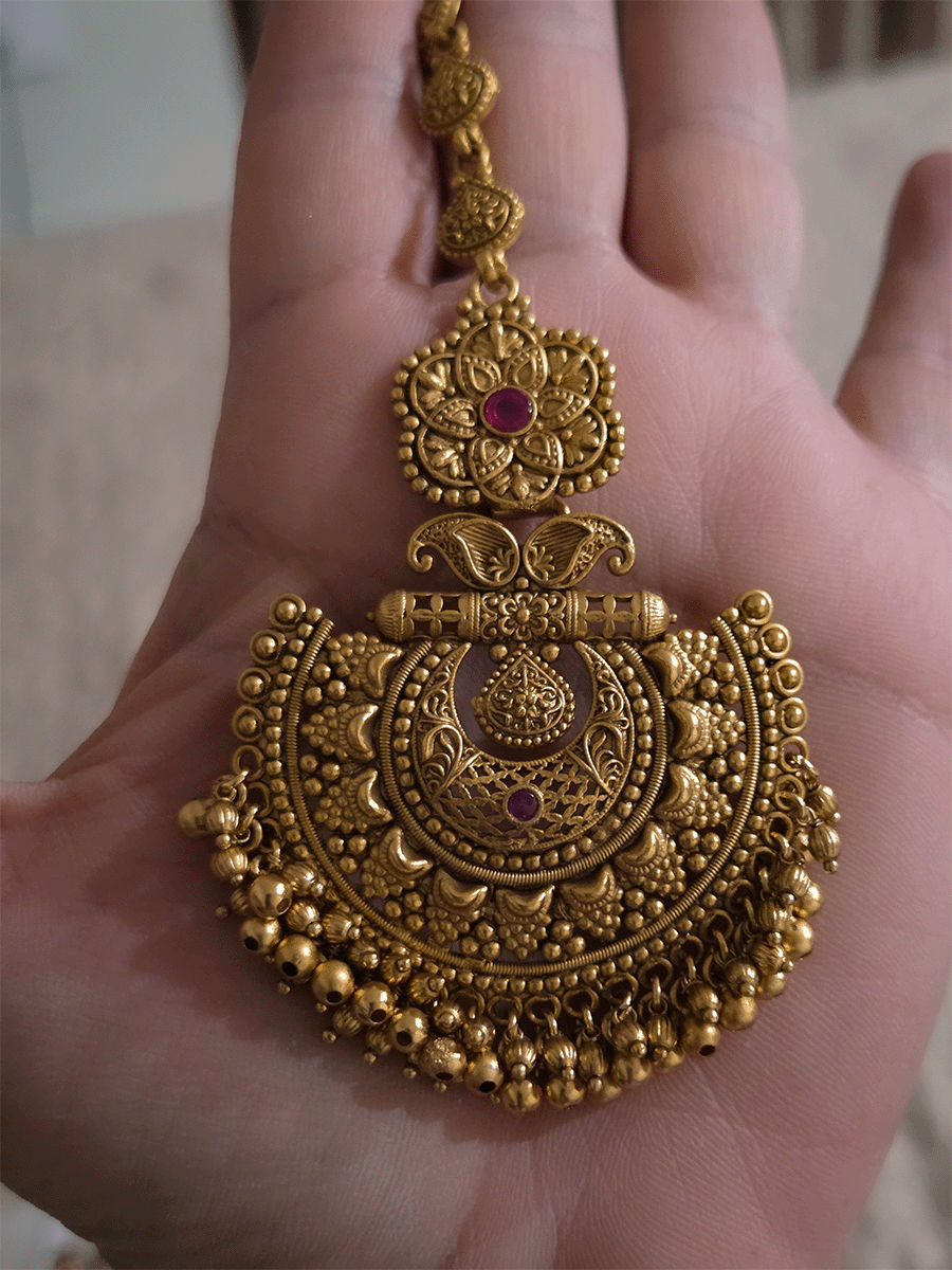 Flower top with paisley design half moon design maangtika with gold bead hangings